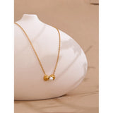Emilia Bow and Pearl Pendant Necklace – Chic & Sweet Golden Jewelry | Huna Jewelry